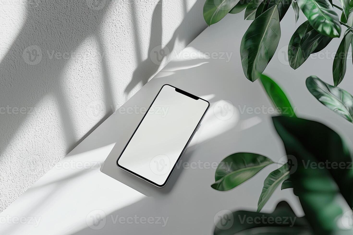 Smartphone with blank screen placed on background surface photo