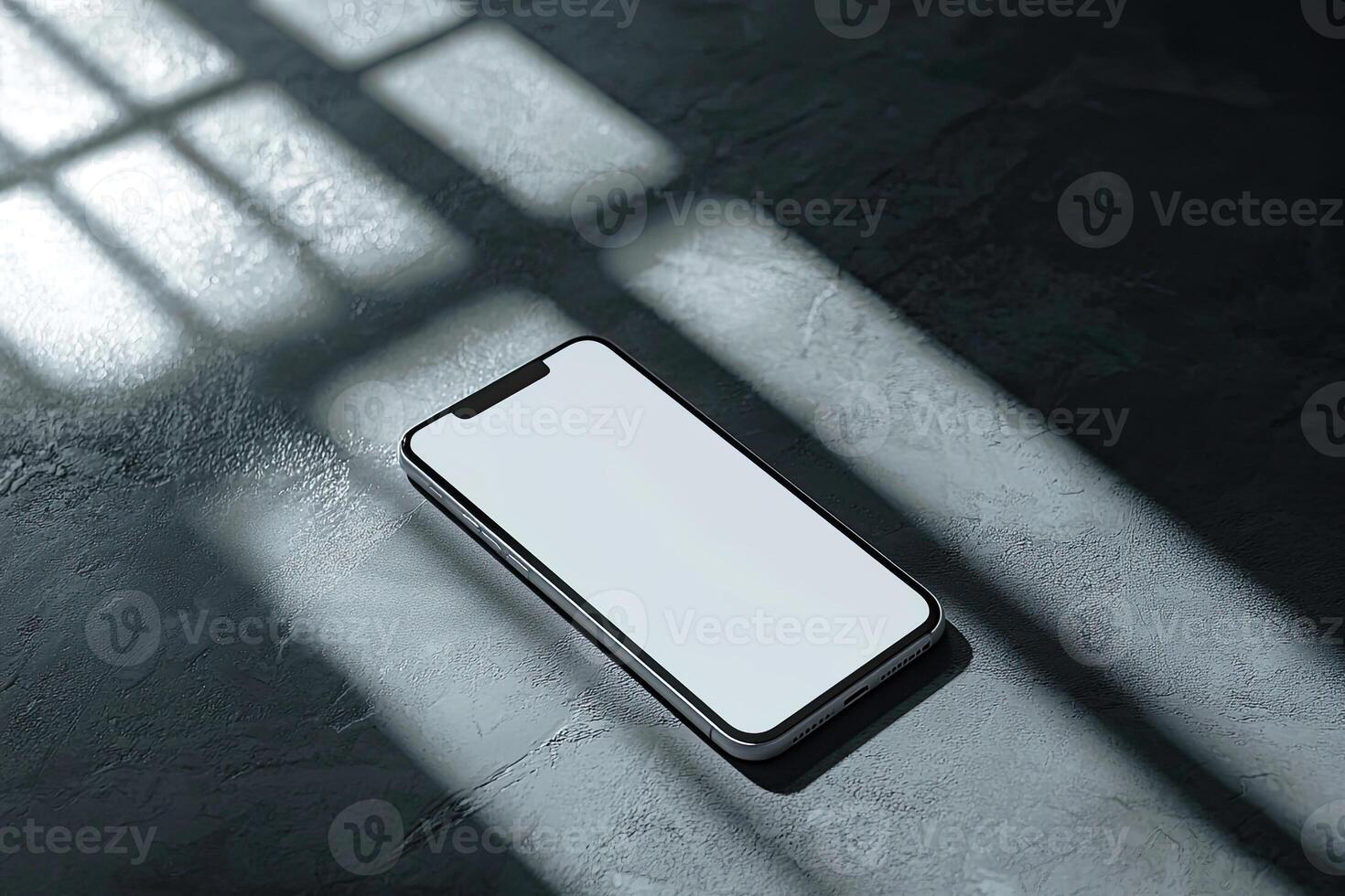 Smartphone with blank screen placed on background surface photo