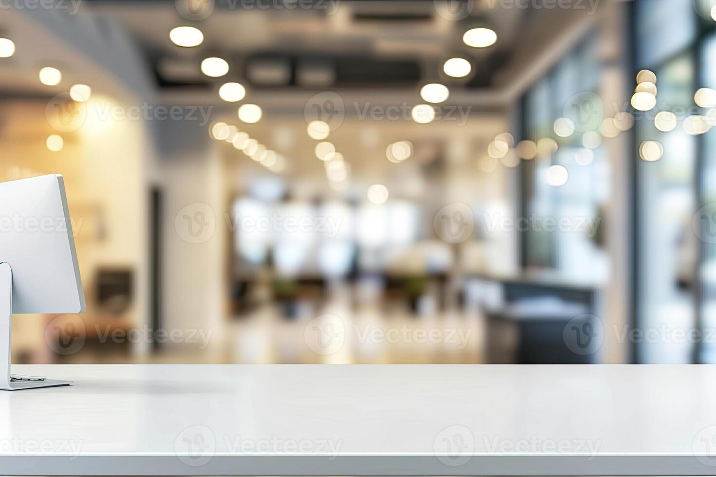 Blurred office background with a computer and white desk in a modern interior, a business work space concept, a mockup for product display presentation, with a white background photo