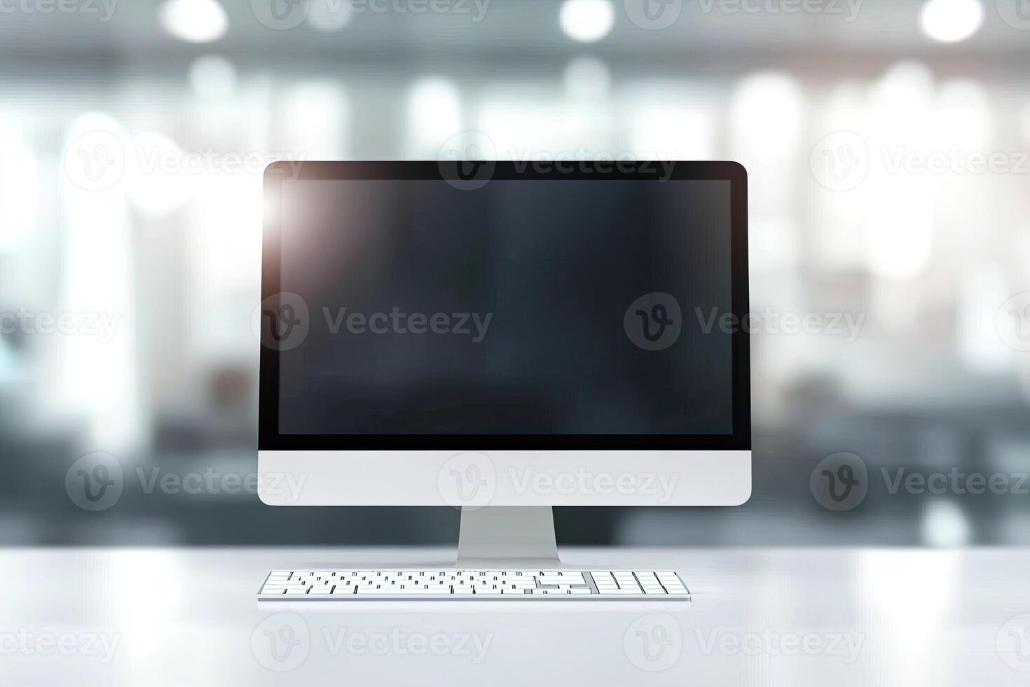 Blurred office background with a computer and white desk in a modern interior, a business work space concept, a mockup for product display presentation, with a white background photo