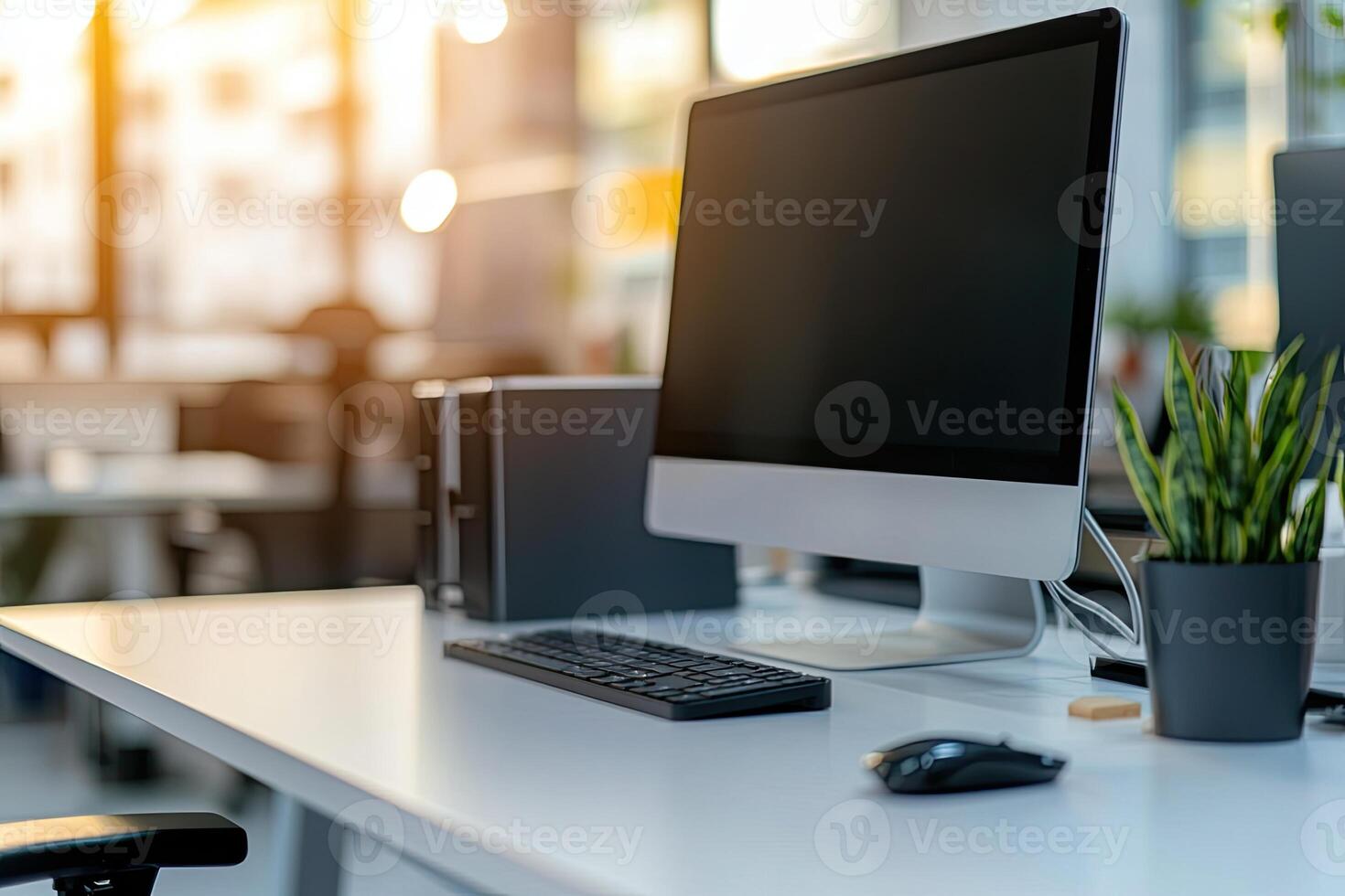 Minimalist white desk with a computer and office background, blurred business center interior in the blurred background. Mockup for design or presentation photo