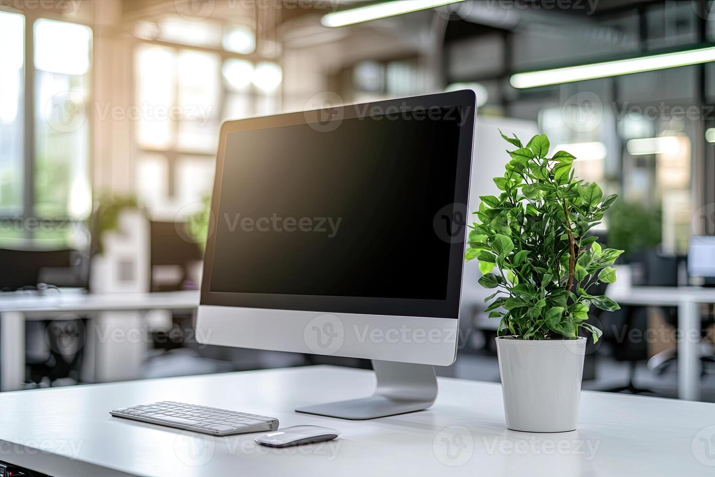 Minimalist white desk with a computer and office background, blurred business center interior in the blurred background. Mockup for design or presentation photo