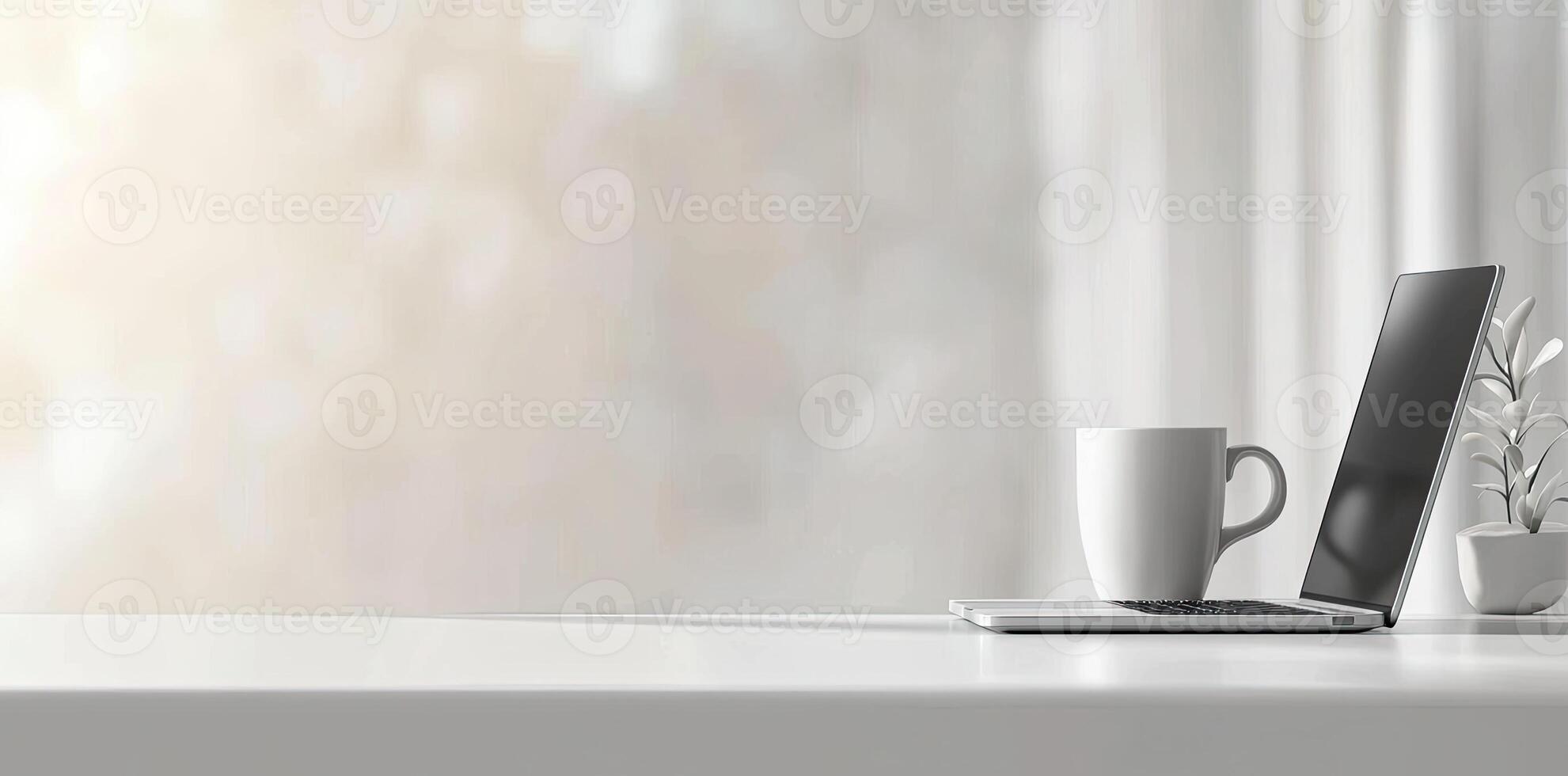 Minimalist white office desk with laptop and coffee mug on a blurred background, with space for text, representing the concept of working from home photo