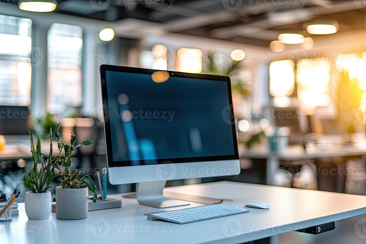 Minimalist white desk with a computer and office background, blurred business center interior in the blurred background. Mockup for design or presentation photo
