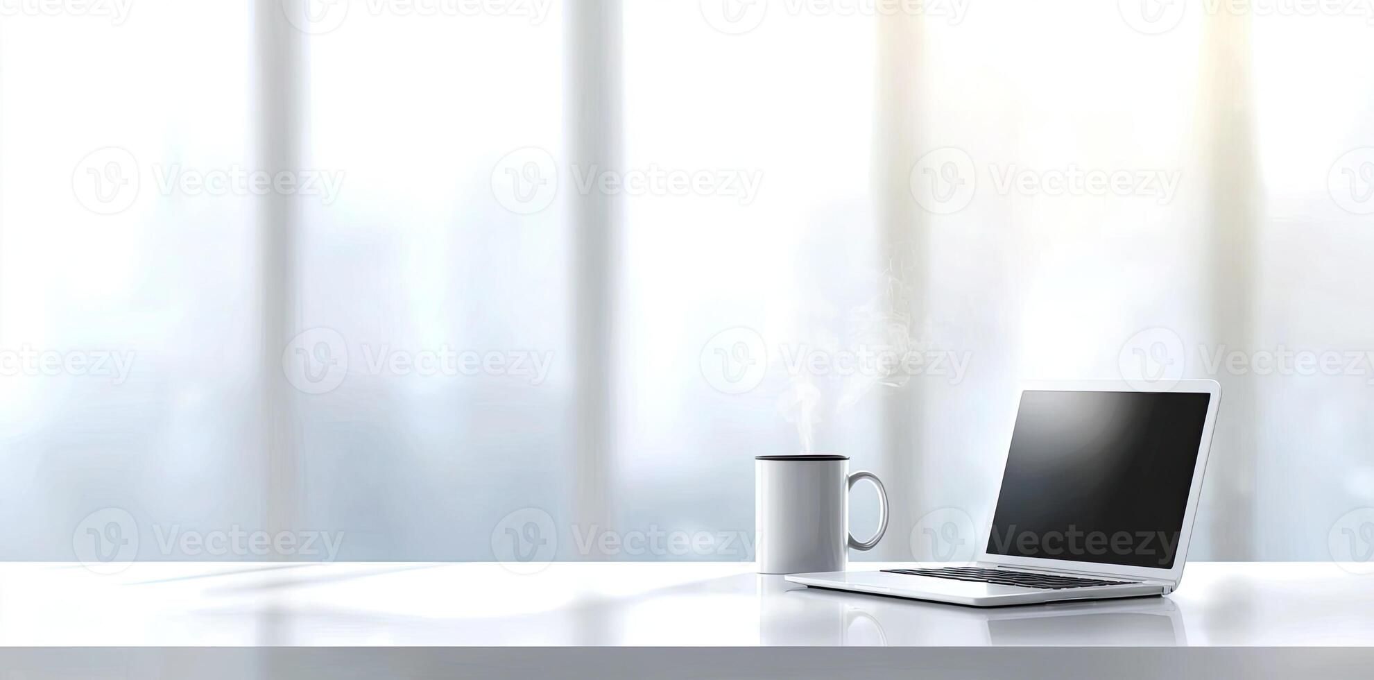 Minimalist white office desk with laptop and coffee mug on a blurred background, with space for text, representing the concept of working from home photo