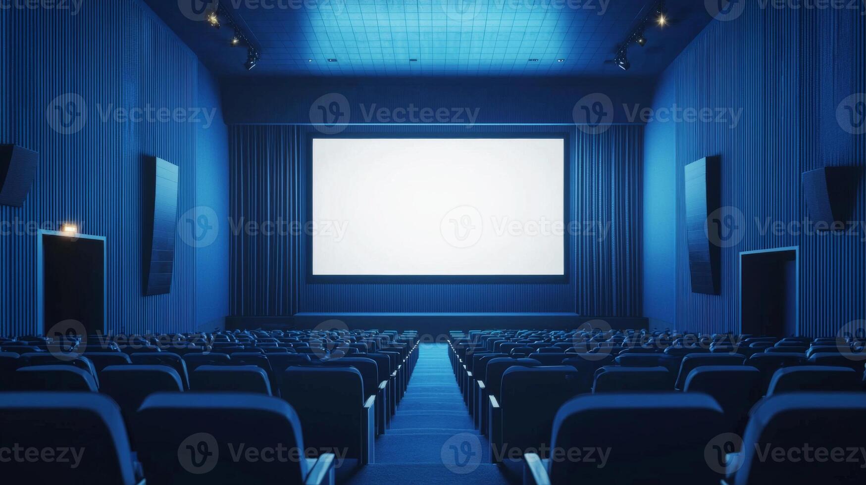 Empty cinema auditorium in blue color with white blank screen. Mockup of hall photo
