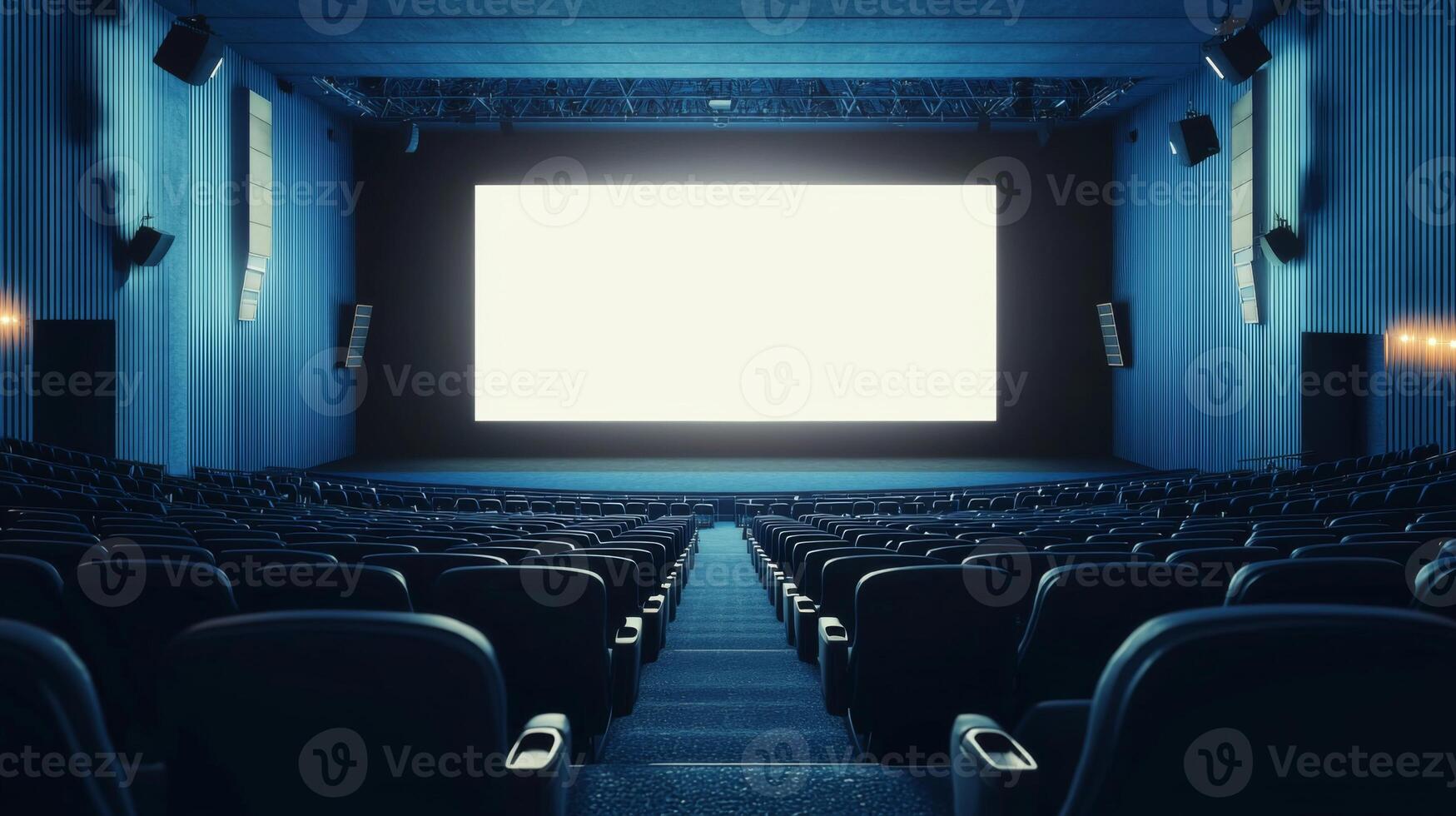 Empty cinema auditorium in blue color with white blank screen. Mockup of hall photo