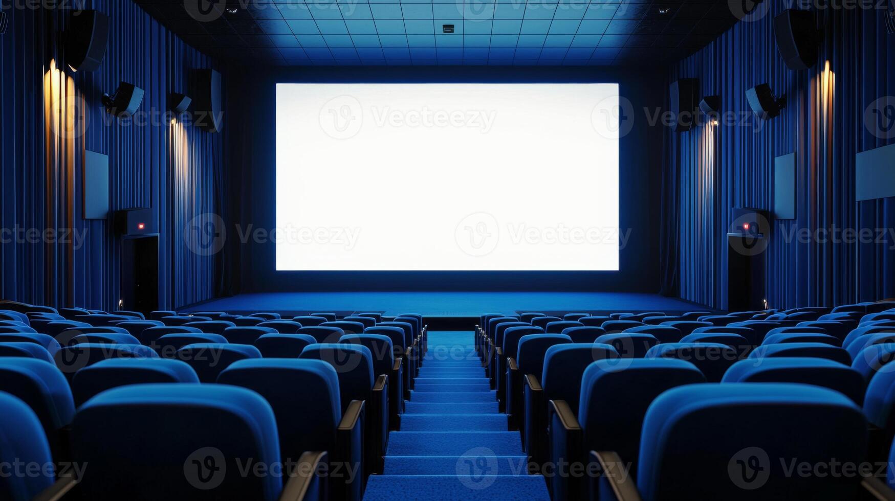 Empty cinema auditorium in blue color with white blank screen. Mockup of hall photo