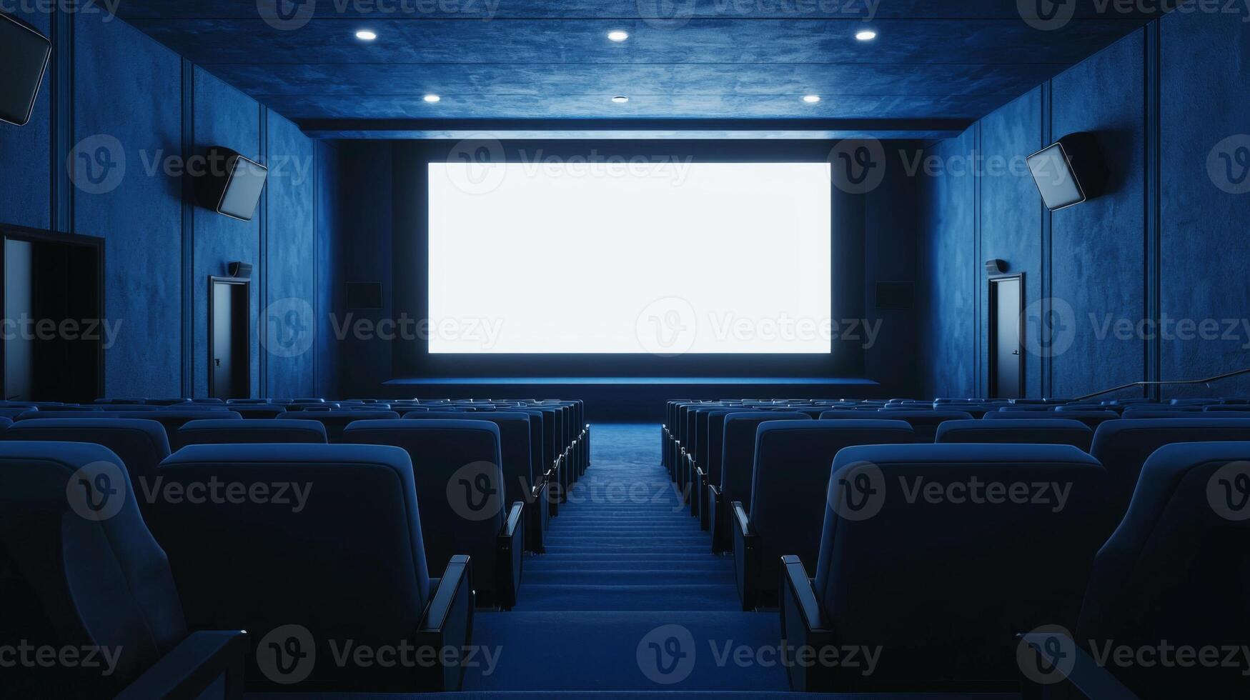 Empty cinema auditorium in blue color with white blank screen. Mockup of hall photo