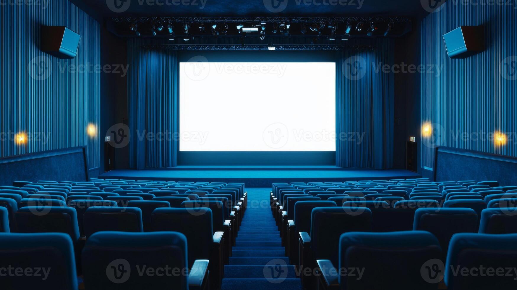 Empty cinema auditorium in blue color with white blank screen. Mockup of hall photo