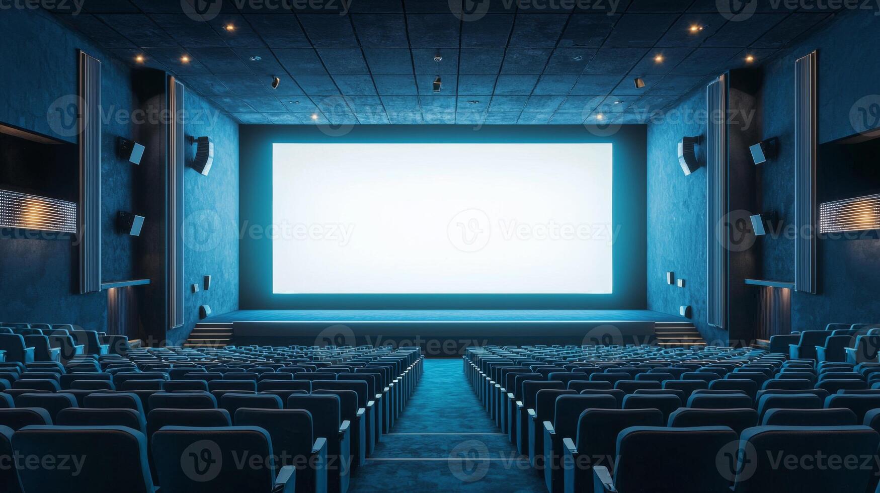 Empty cinema auditorium in blue color with white blank screen. Mockup of hall photo