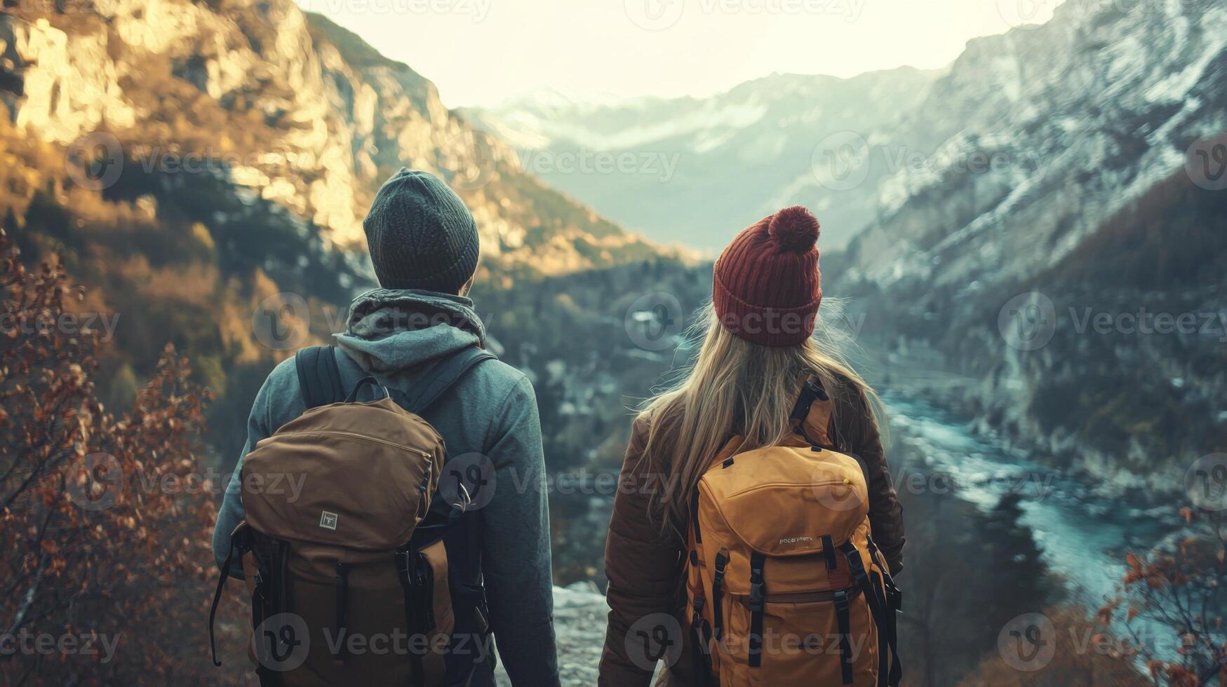 Couple traveling together and exploring new places. Beautiful couple walking with backpacks photo