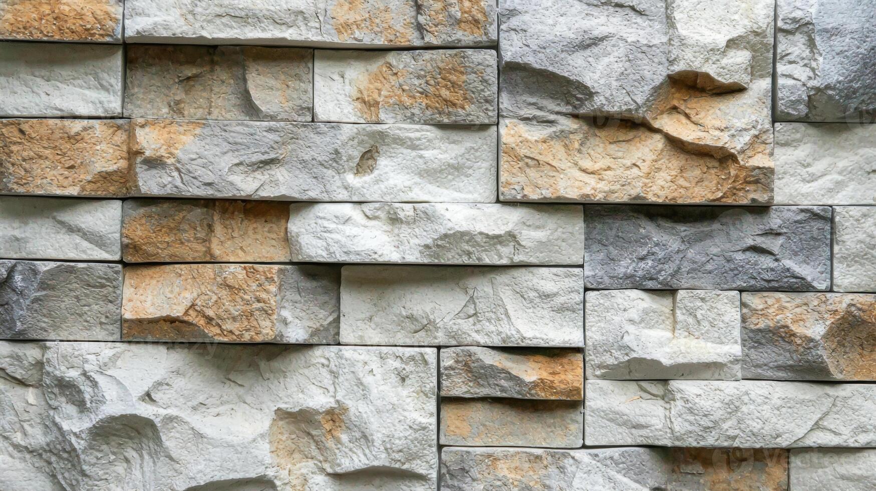 Natural stone wall with a stunning granite texture ideal for architectural and design projects photo