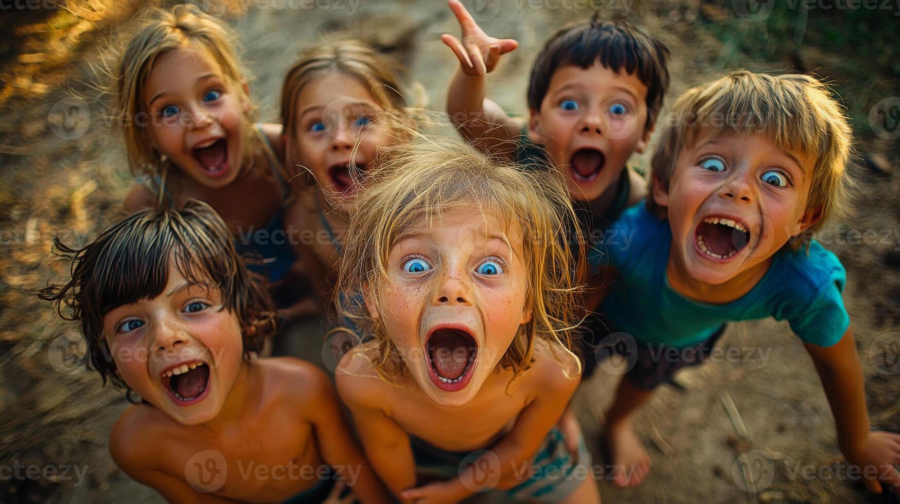 Children making silly and goofy faces, capturing the expressive gestures of their facial expressions photo