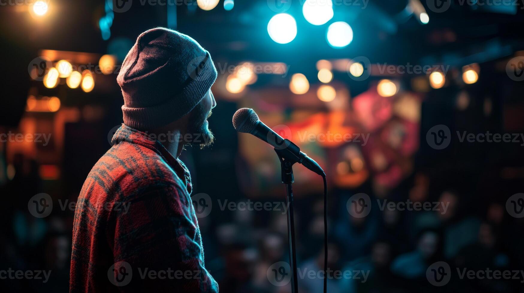 Comedian performing stand-up show on stage routine in comedy club photo