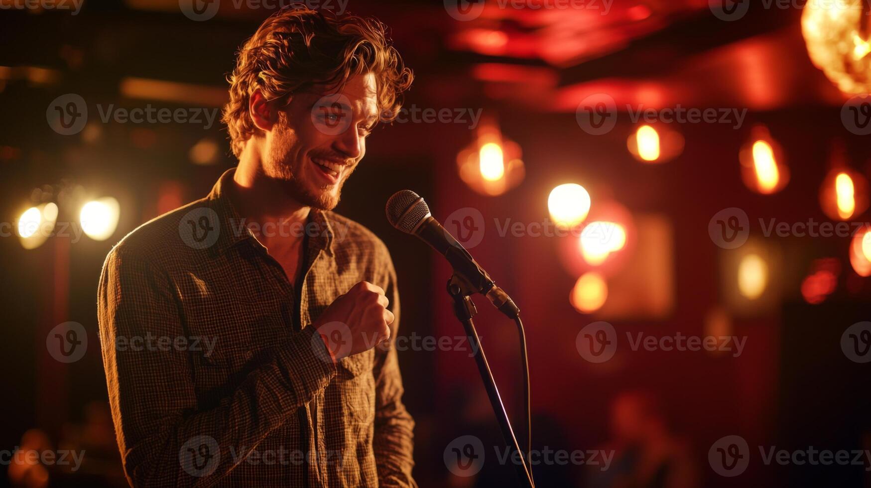 Comedian performing stand-up show on stage routine in comedy club photo