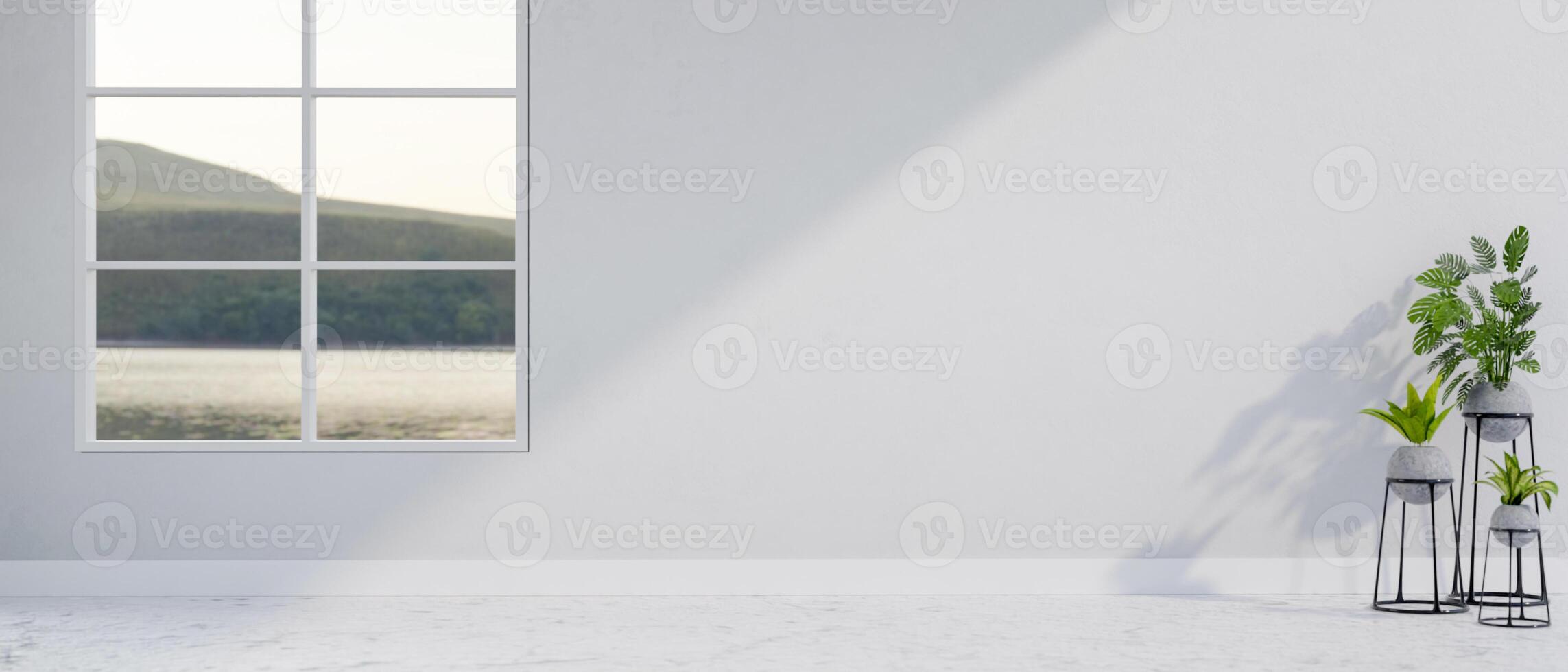 An empty white room features a window with a view, indoor plants, and an open space on a white wall. photo