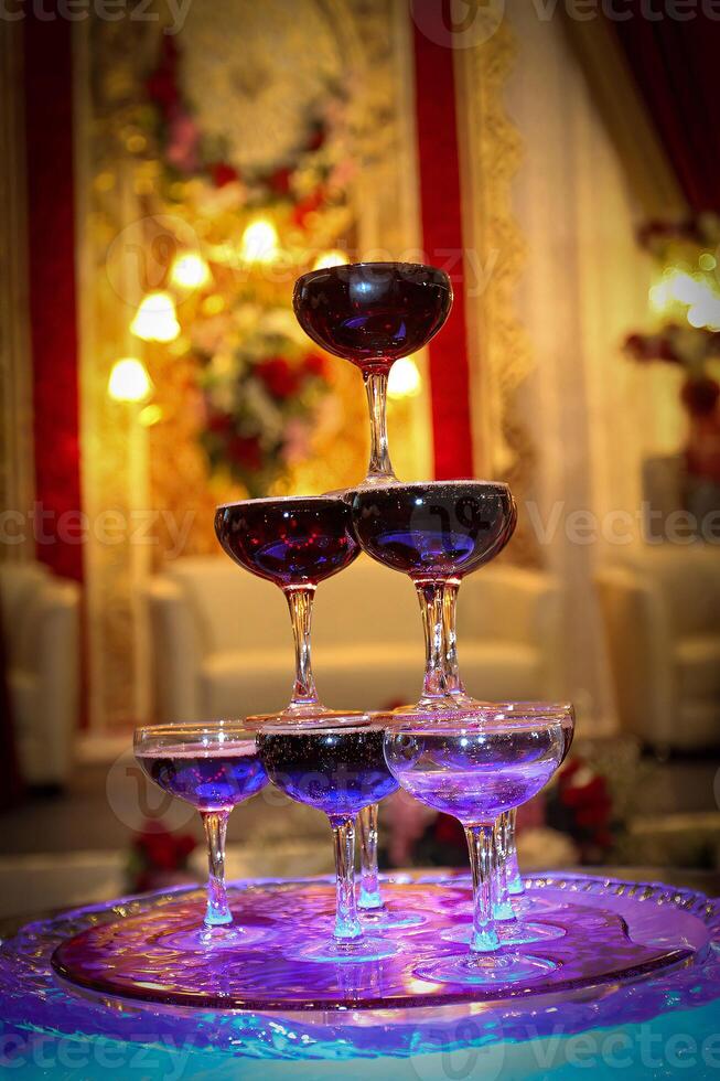 A table with wine glasses on it photo