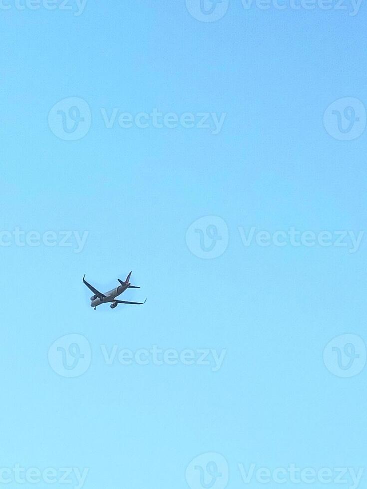 A plane flying in the sky photo