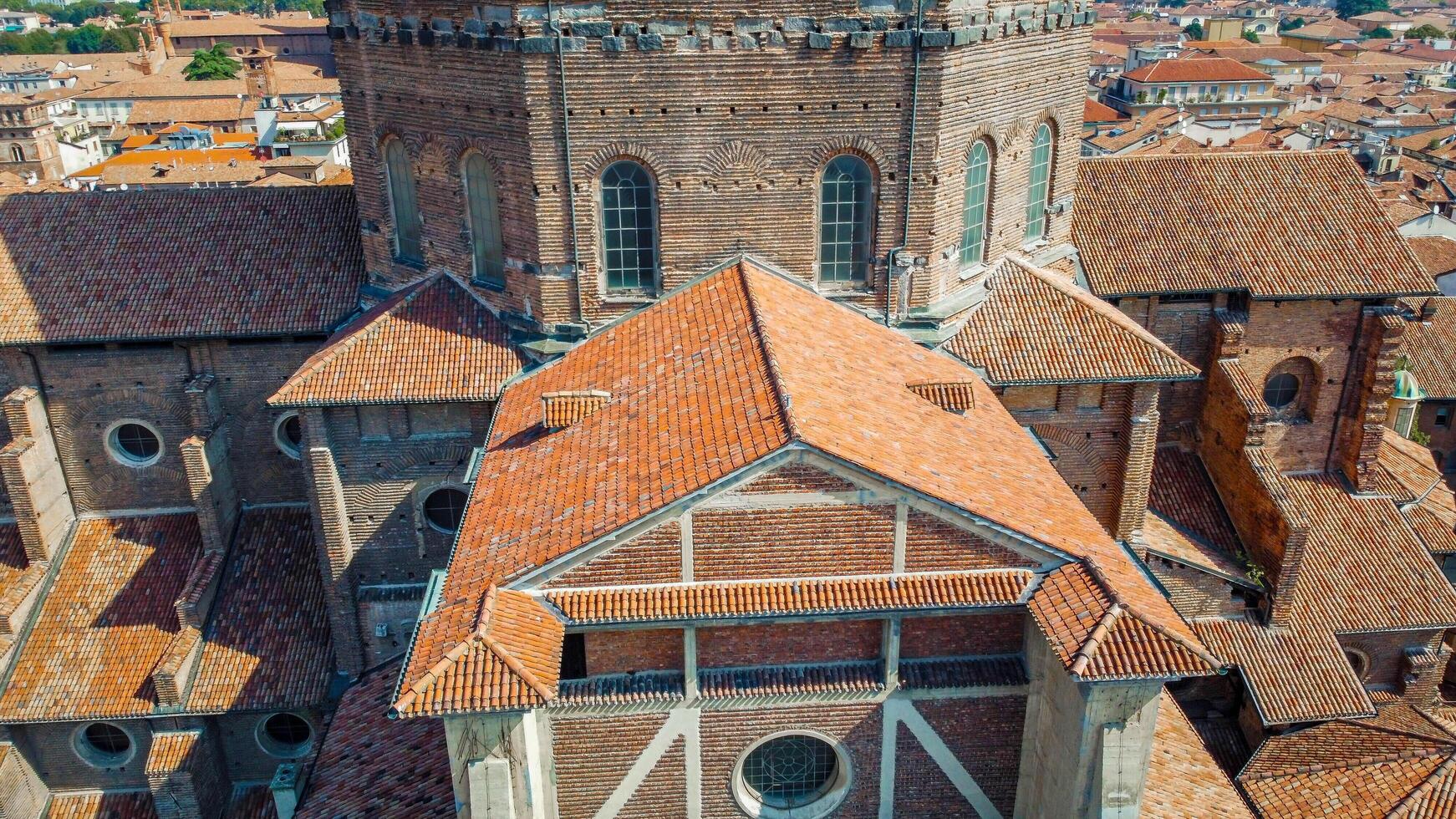 Duomo di Pavia seen from a drone, Cattedrale di Santo Stefano e Santa Maria. Imponente chiesa rinascimentale. Arte e architettura italiana. photo