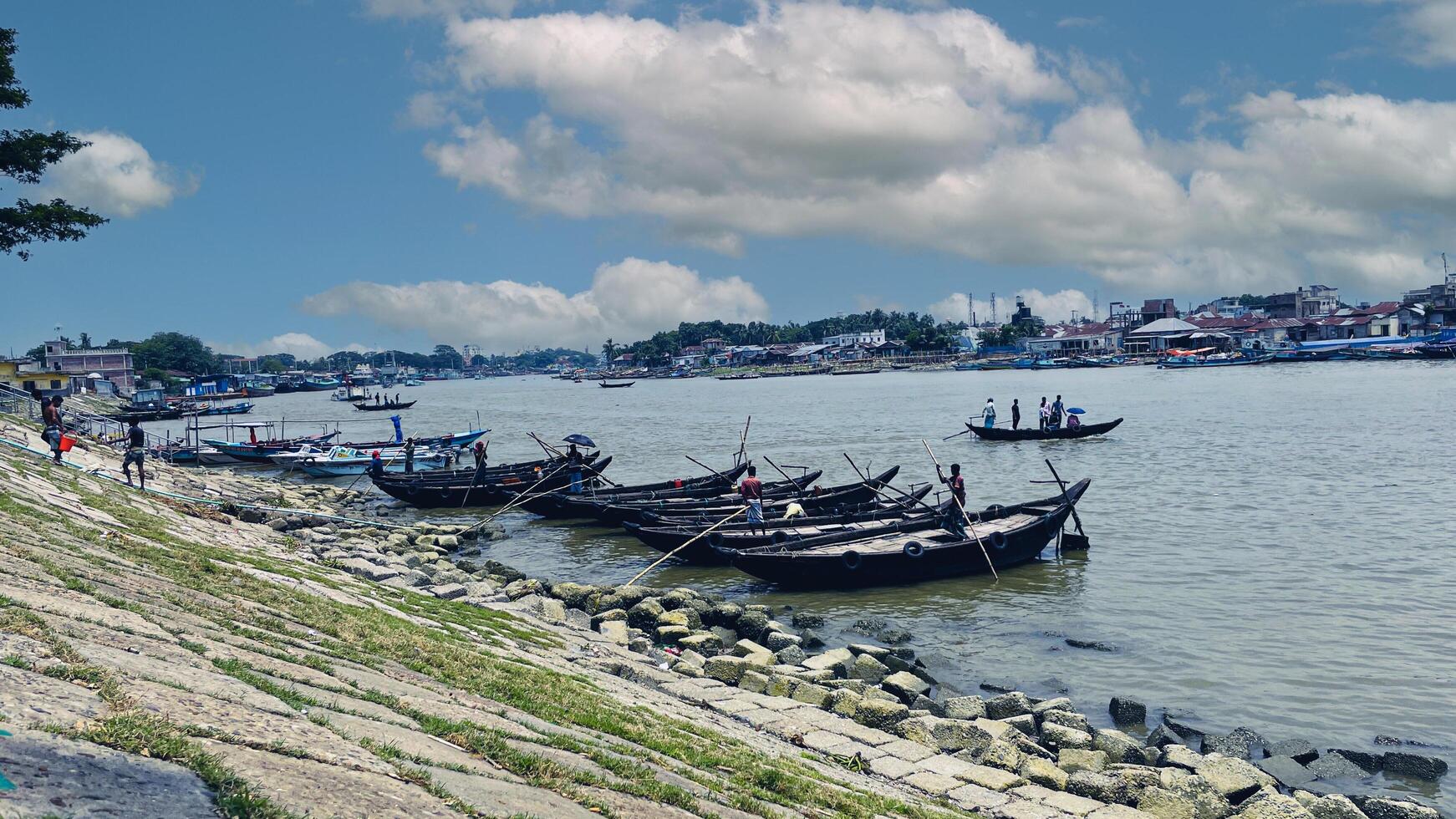 Boats on the Dakatia River Chandpur, Bangladesh photo