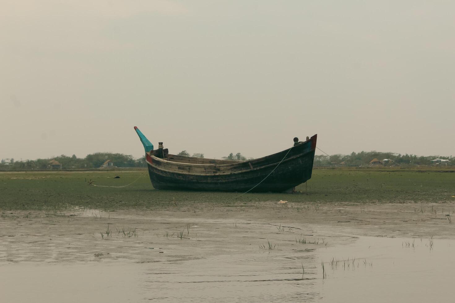 Beautiful Boat Preparing to Launch into the Waters of Nijhum Dwip photo