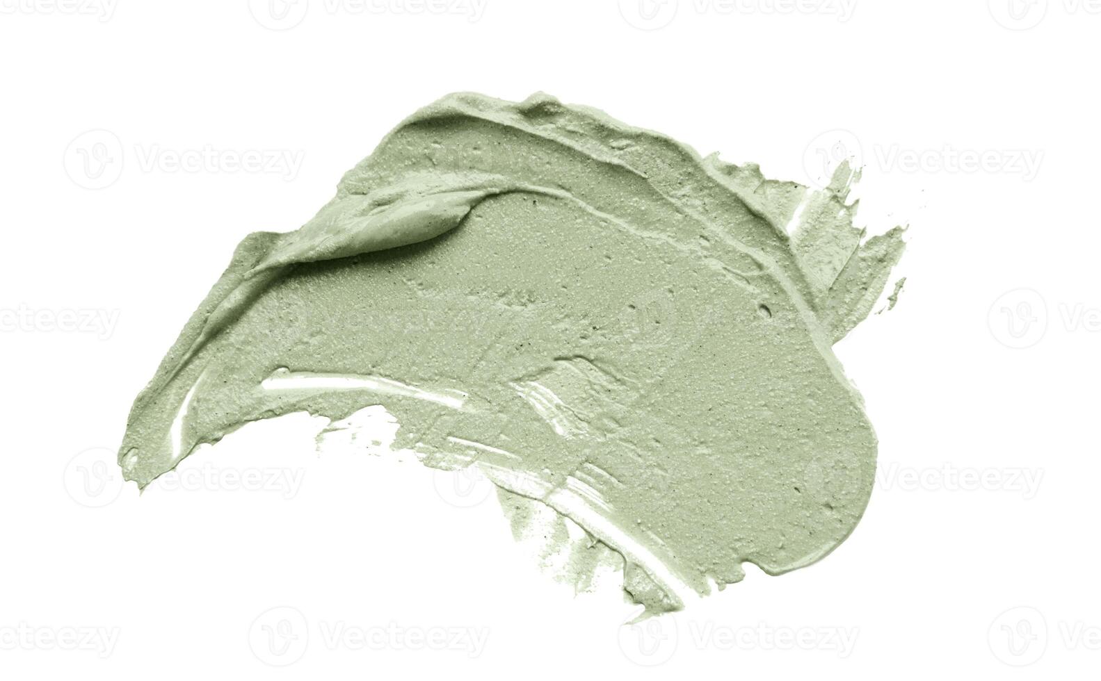 Cosmetic mud mask smear isolated on white background. Top view, closeup texture of blue facial clay, copy space photo