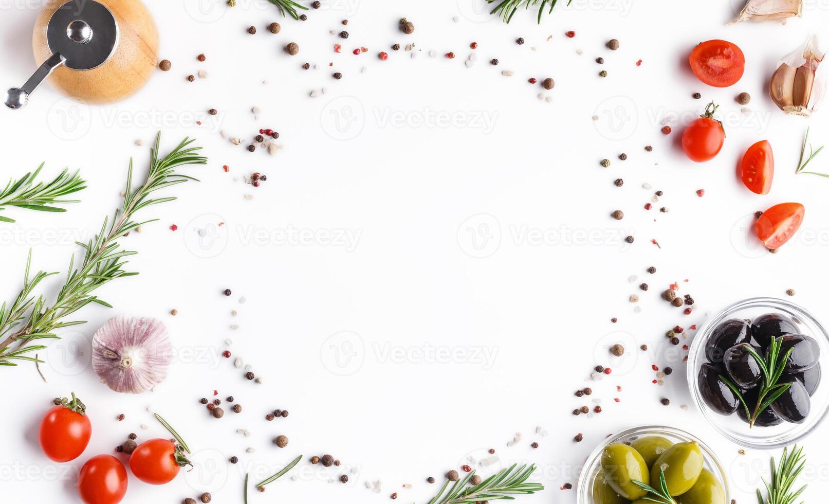 Fresh olives, cherry tomatoes, herbs end spices scattered on white background, copy space, top view. Food background concept, recipe mockup photo
