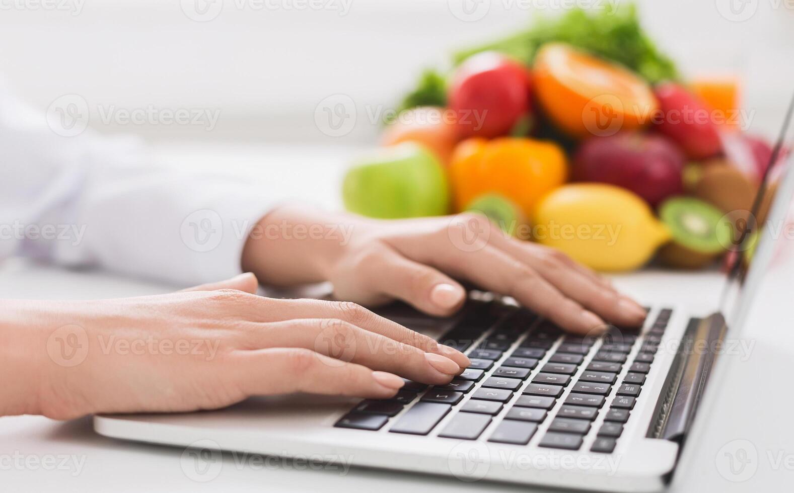 Healthy eating and food coach concept. Nutritionist consultation online, dietitian typing treatment to patient via internet, copy space photo