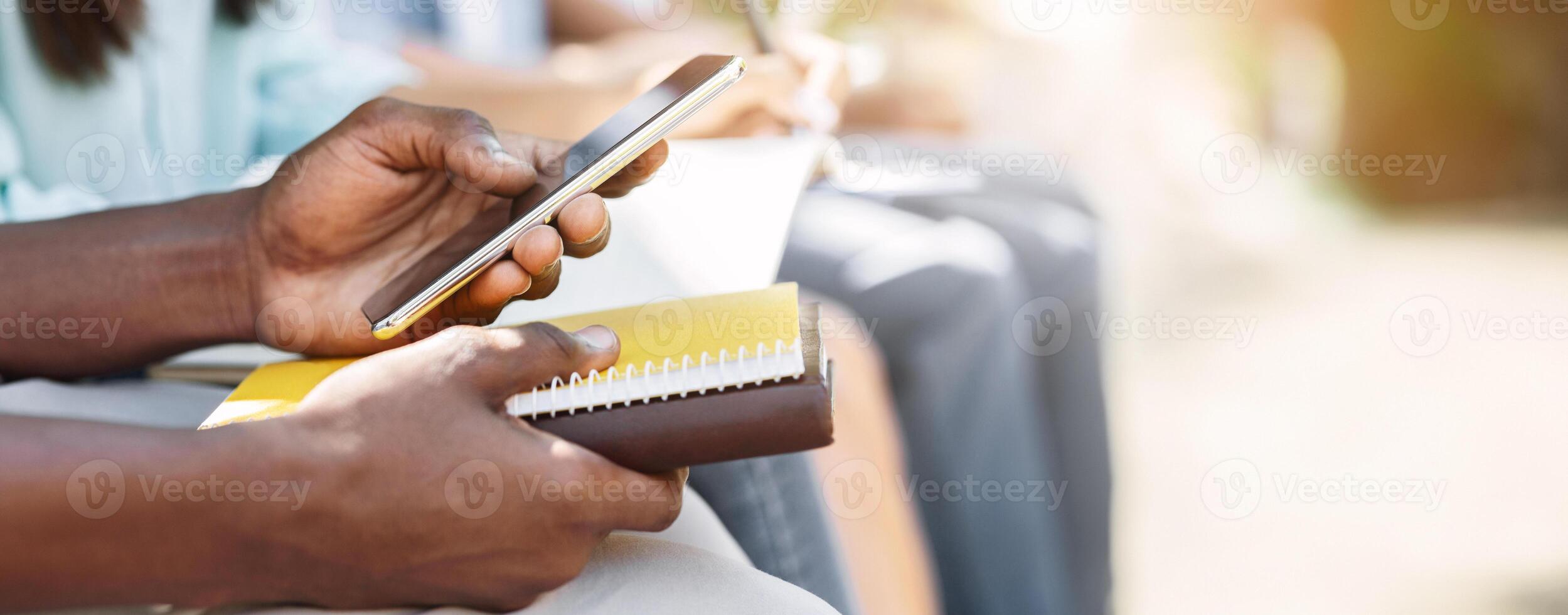 Modern Technologies For Education. Smartphone In Hands Of Unrecognizable Black Female Student, Cropped Image, Closeup photo