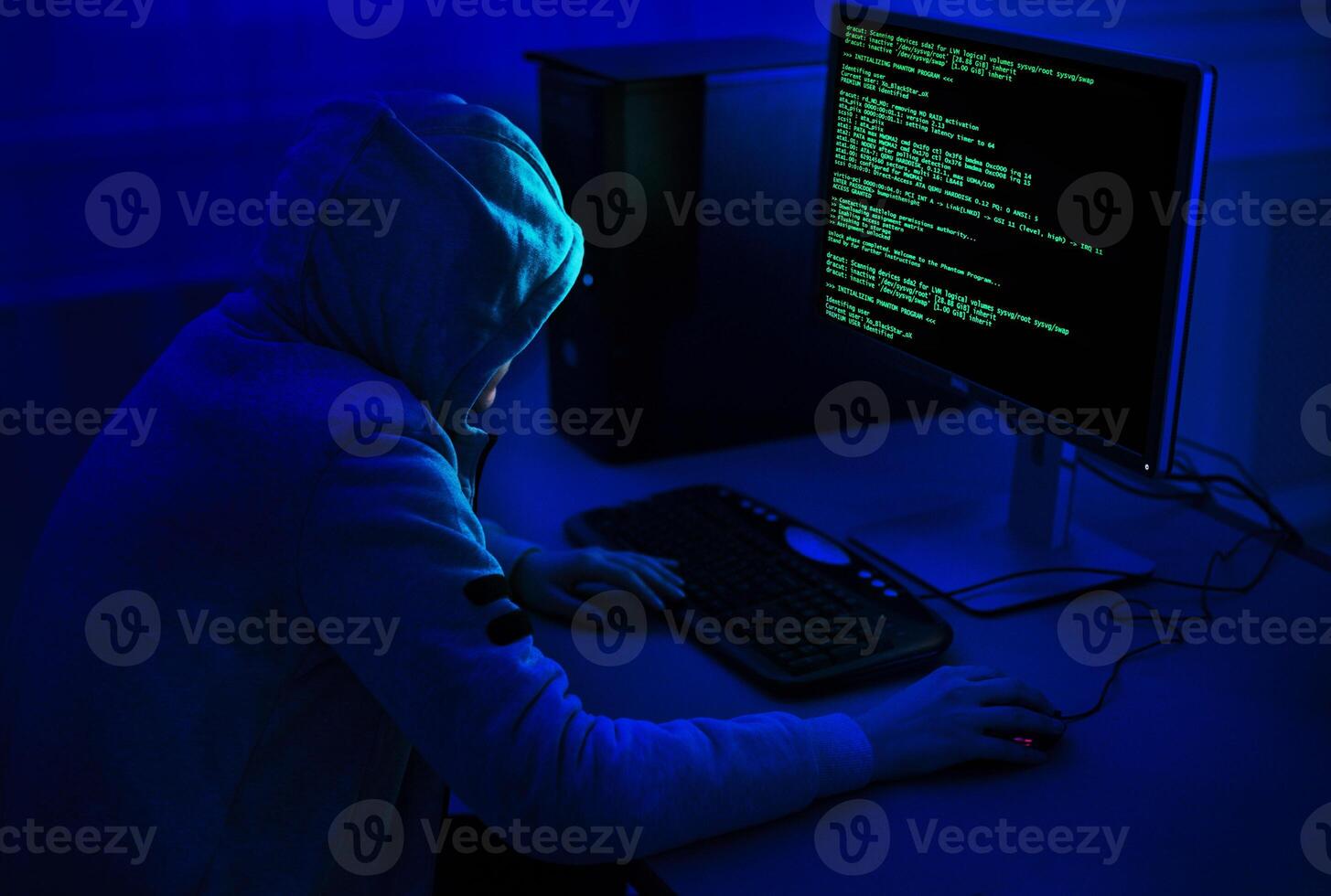 Cybercrime and Hacking Concept. Unrecognizable Hacker Using Computer Virus Program For Cyber Attack photo