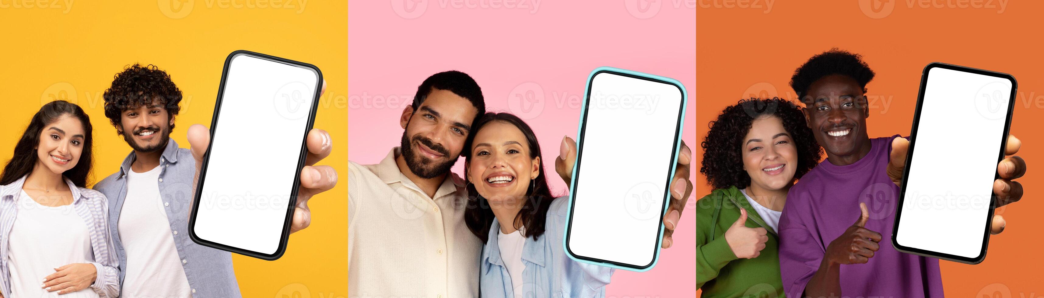Diverse young couples showing smartphones with white blank screens, posing on colorful background, recommending nice mobile app photo