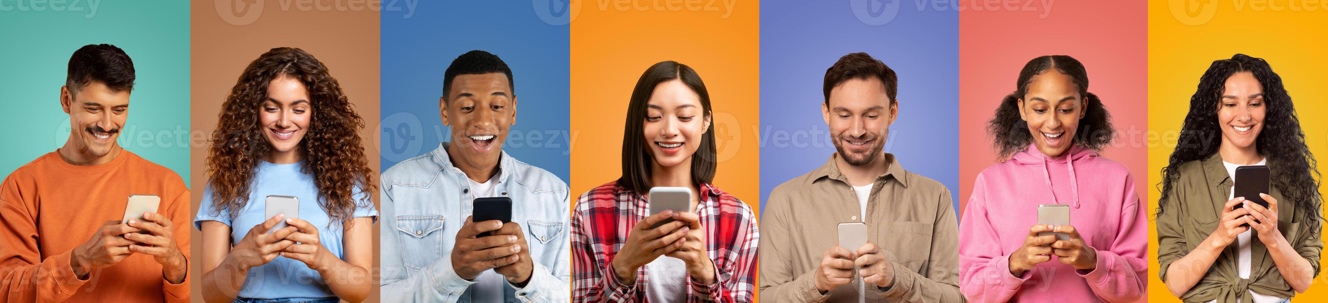 A group of seven friends, featuring diverse backgrounds, are smiling and focused on their smartphones. The vibrant background colors reflect a joyful indoor atmosphere. photo