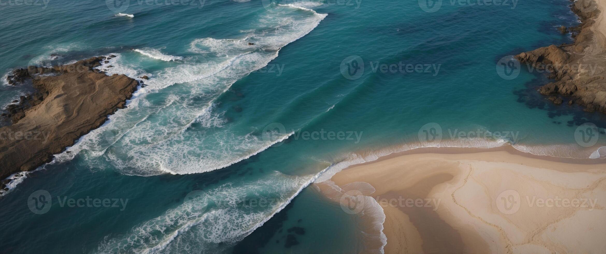An aerial view of the ocean and beach photo