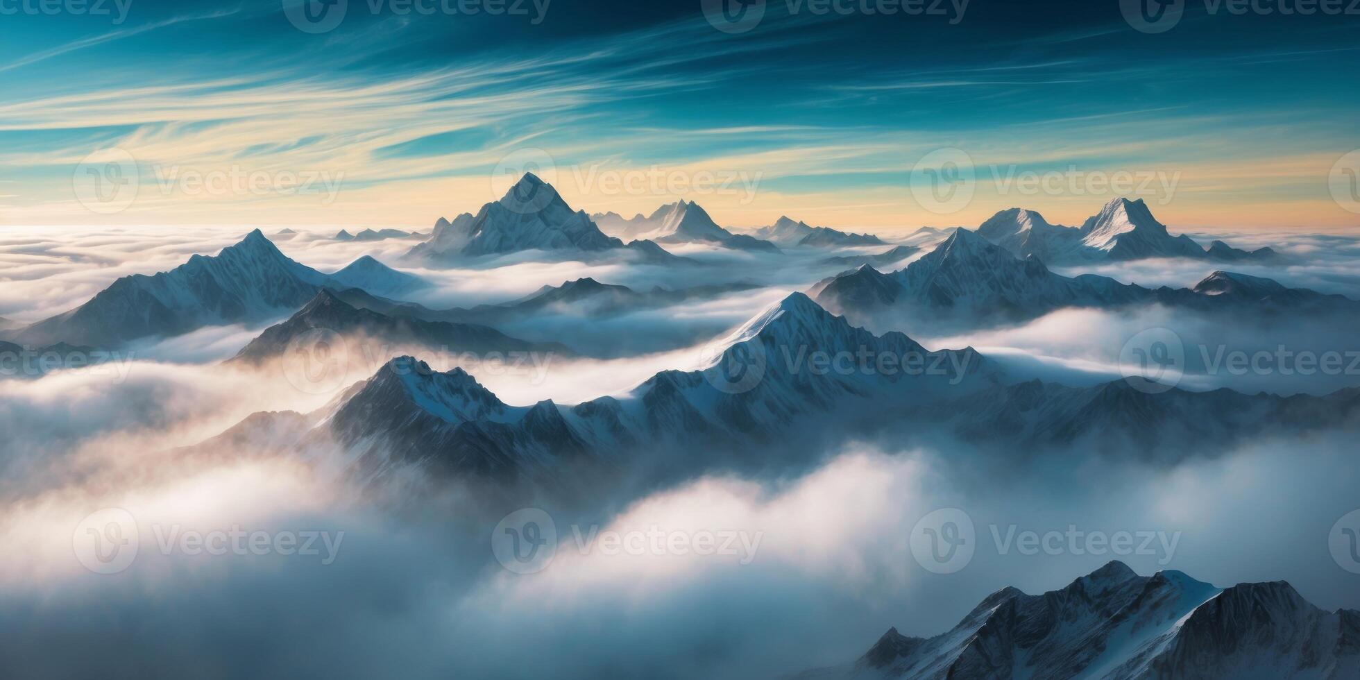 A view of the mountains covered in clouds photo