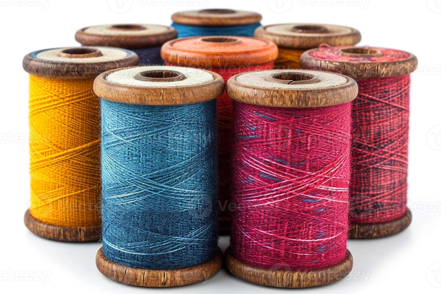 A spool of thread with different colors photo