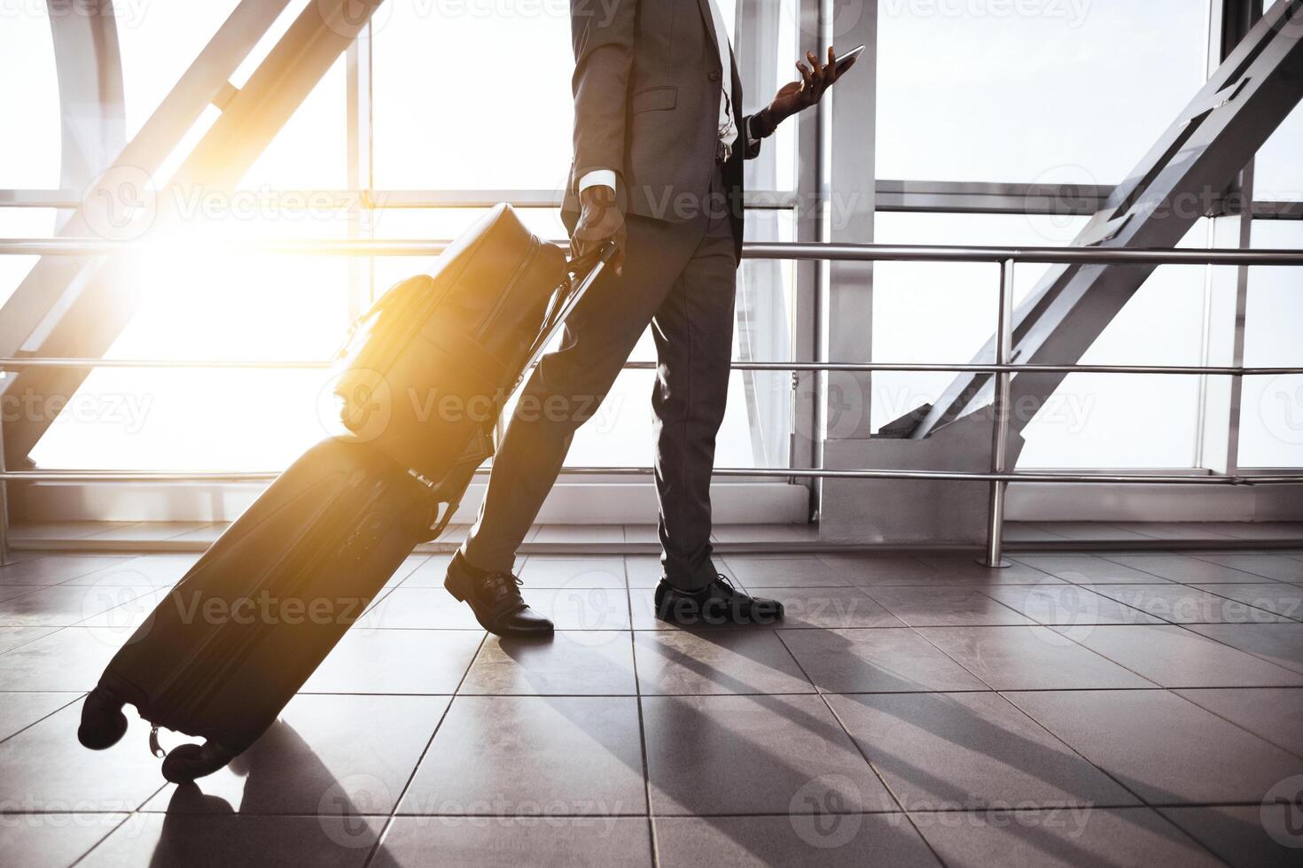 Go On Plane. Businessman Carrying Baggage, Moving to Boarding Gate in Airport photo