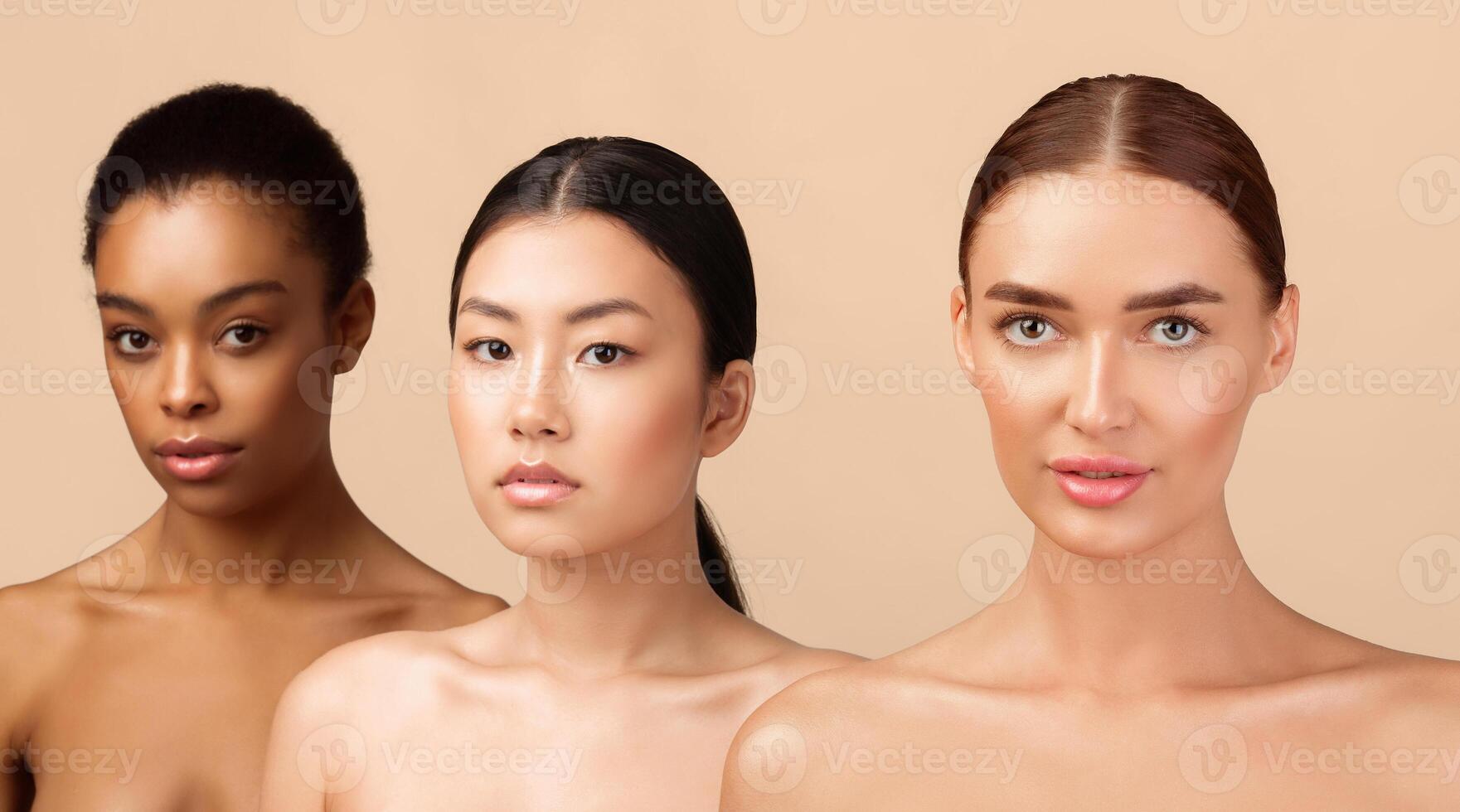 Diverse Female Beauty. Three Gorgeous Young Ladies Posing Naked Standing Over Gray Background In Studio, Looking At Camera. Panorama photo