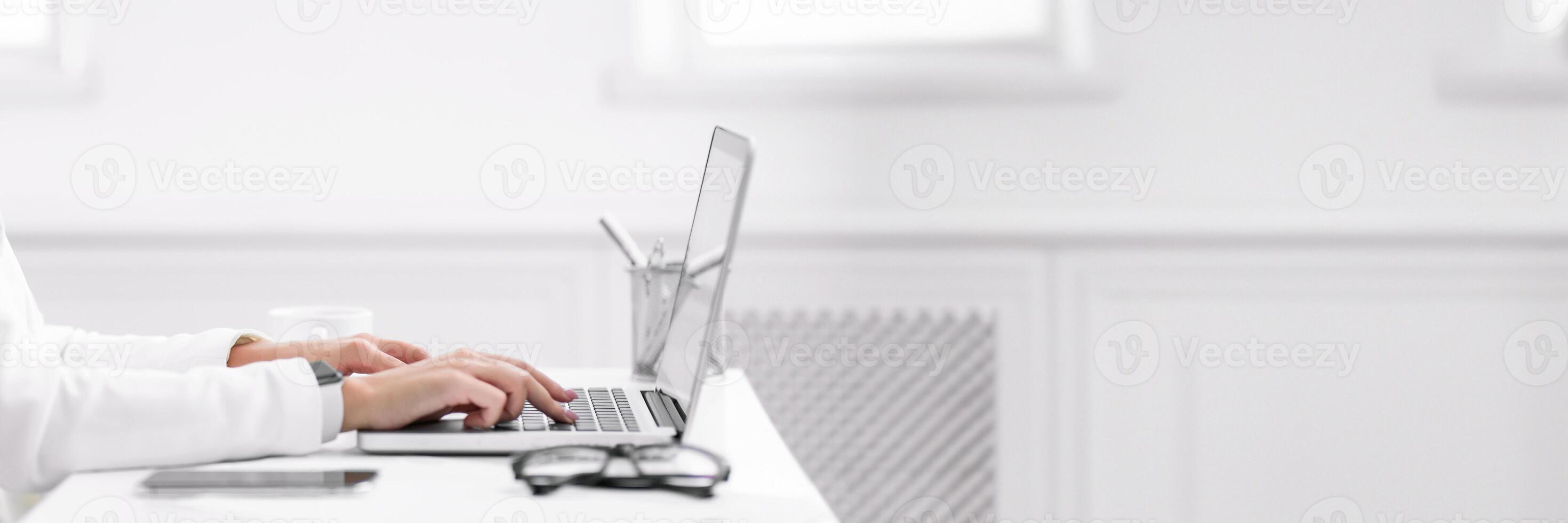 Job Search. Side view of unrecognizable woman using laptop, typing on keyboard, cropped. Free space, panorama photo