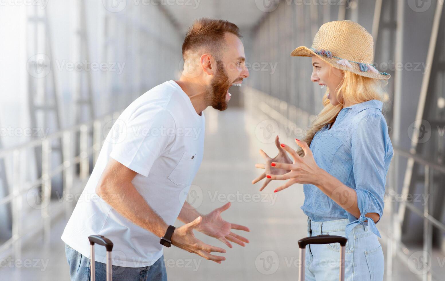 Young tourists arguing because of forgotten things, arriving at airport, side view photo