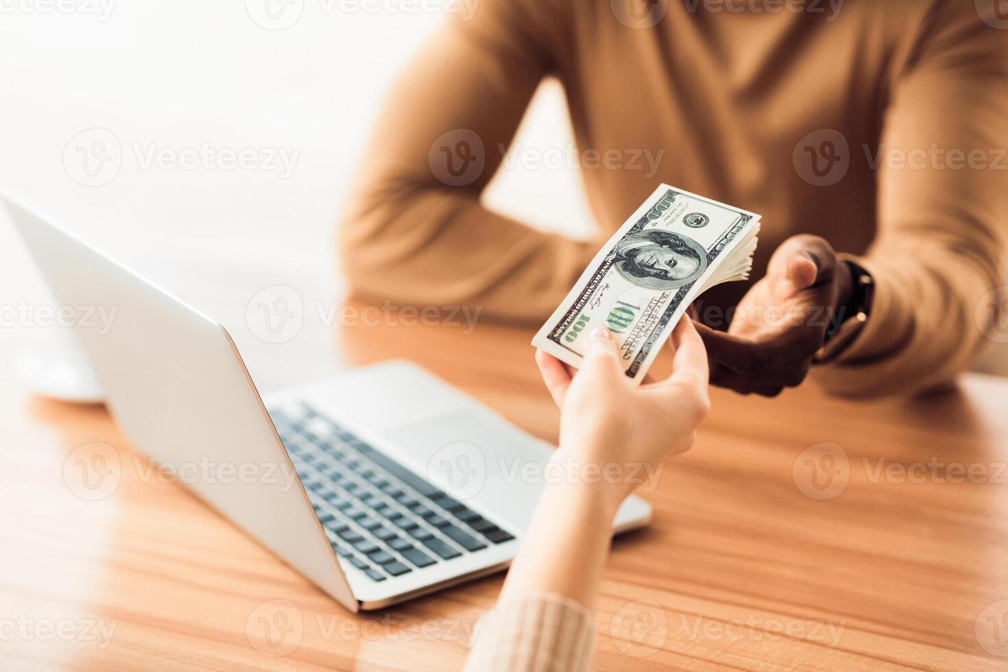 Bribery Concept. Corrupted unrecognizable african businessman receiving money from partner. Copy space photo