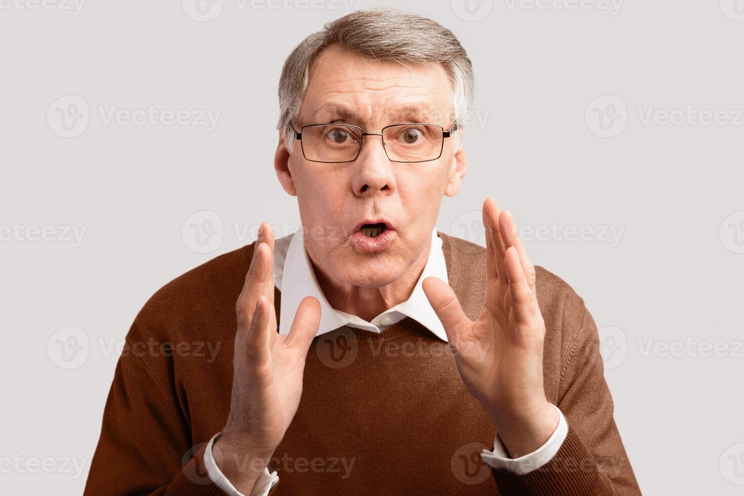 Shocked Elderly Man Looking At Camera Posing Over Gray Studio Background. Don't Do It, Warning Concept photo