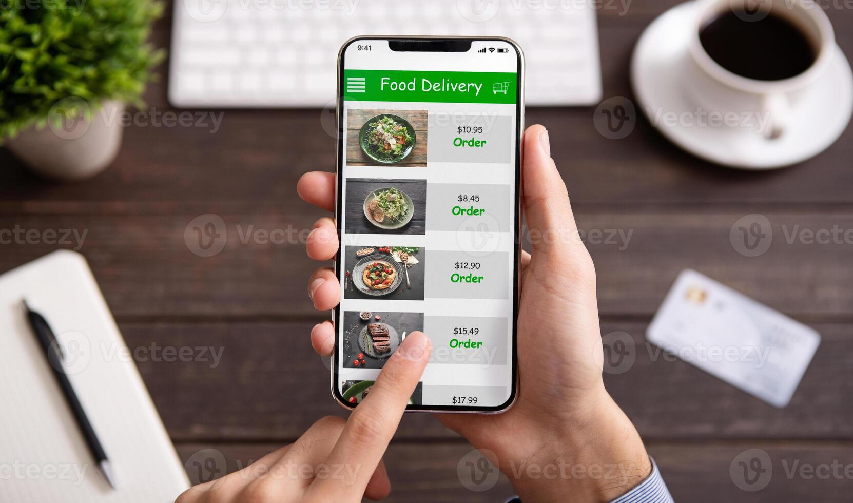 Food delivery. Businessman choosing meal for lunch in takeaway restaurant service on mobile application on smartphone photo