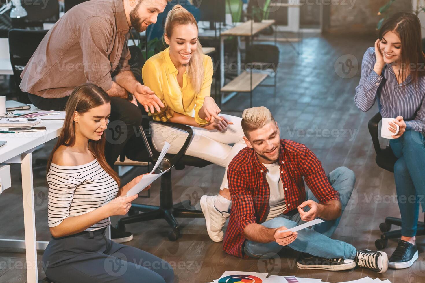 Creative people workplace. Young designers working together with color palettes in office photo