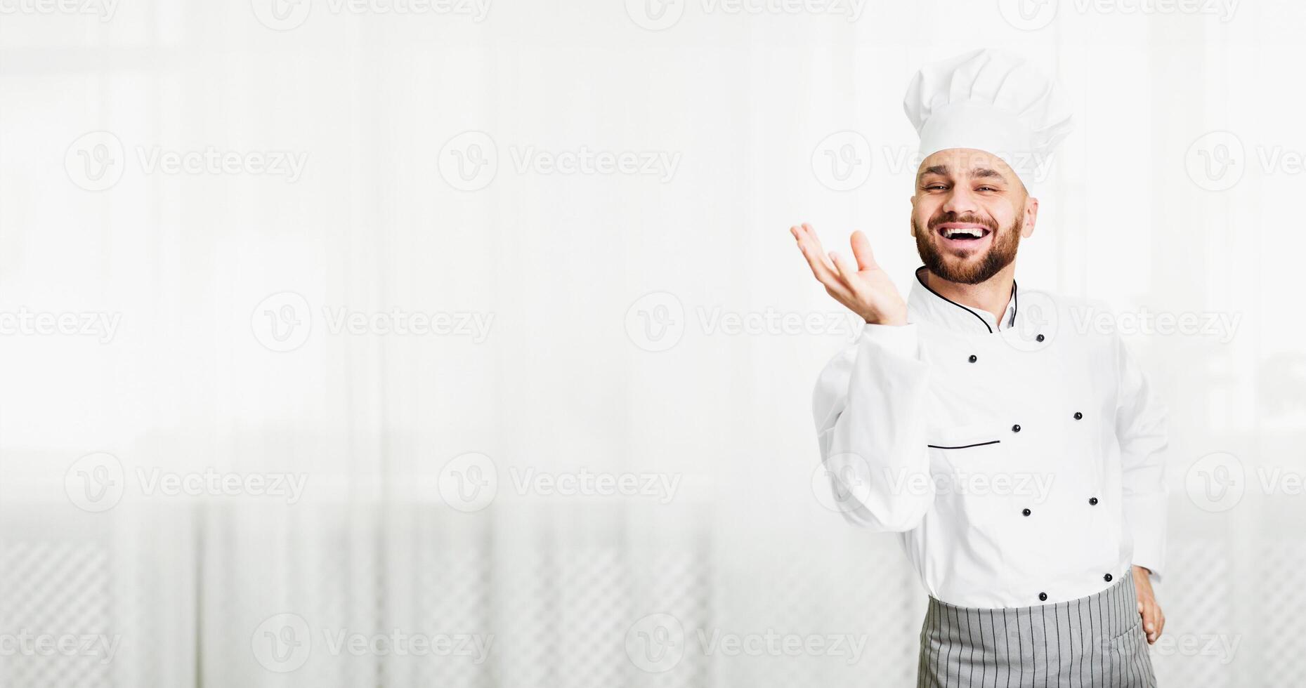 Perfect Taste. Professional Chef Man Gesturing With Hand Approving Recipe Smiling At Camera Standing In Kitchen. Selective Focus photo