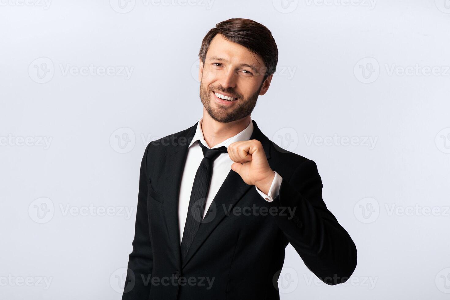 Business Success. Confident Businessman Pointing Thumbs At Himself Standing On White Studio Background. Isolated photo