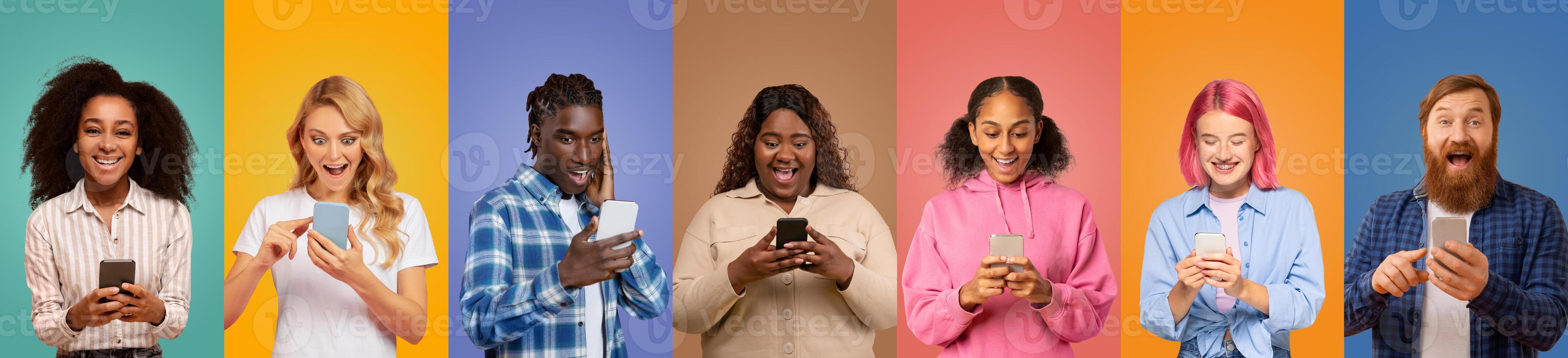 A group of seven friends stands side by side, each engaged with their smartphones, displaying expressions of joy and excitement against colorful backgrounds. photo
