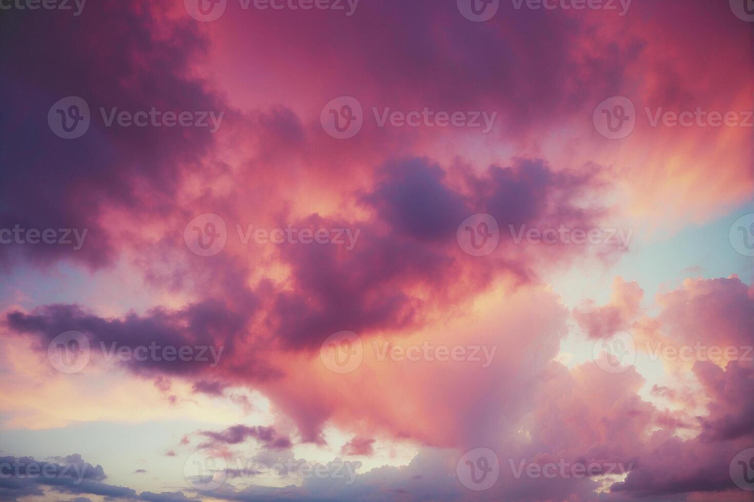 A beautiful sunset over the ocean with clouds photo