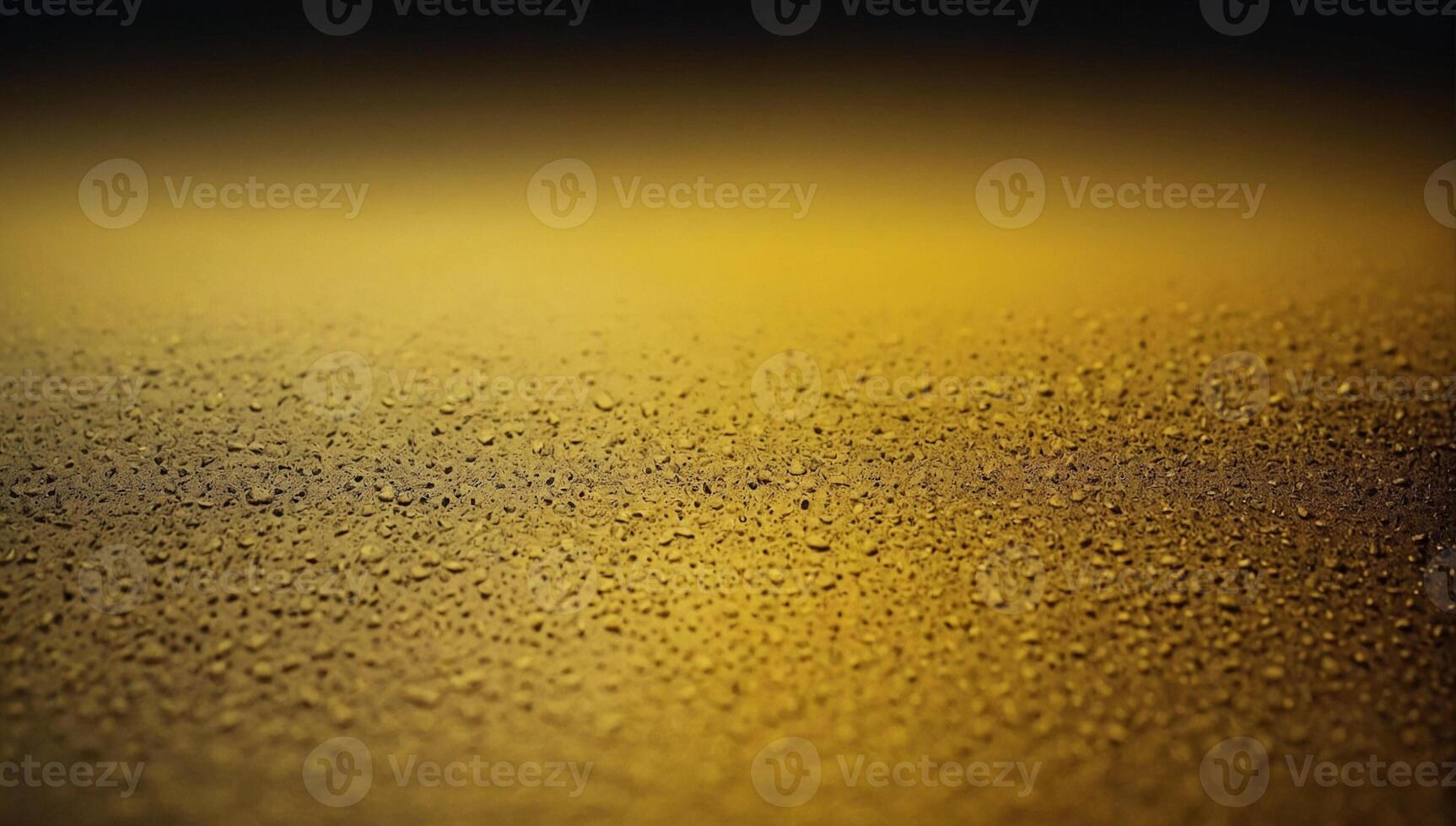 Raindrops on a glass surface with a yellow background photo