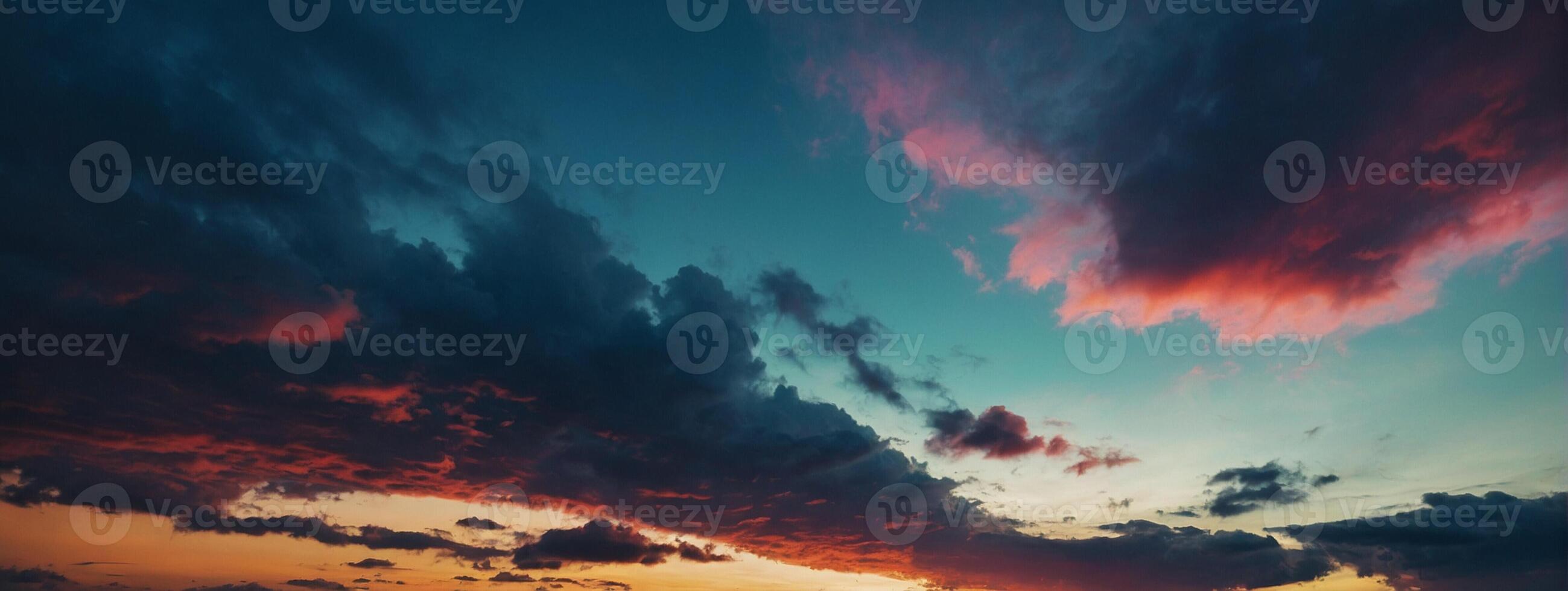 A sunset with clouds and a red sky photo